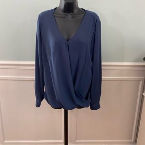 Blue drape blouse.